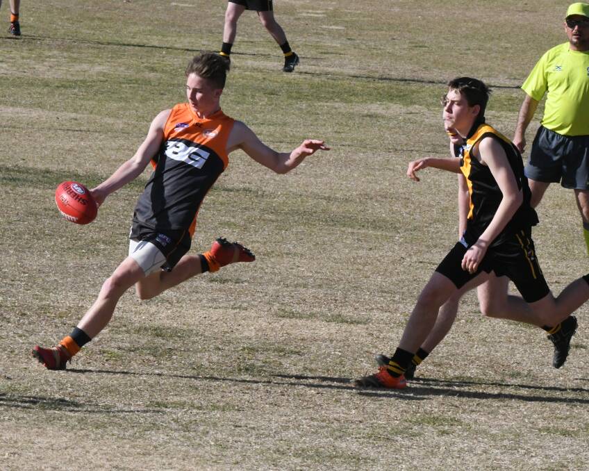 ON THE BURST: Bathurst Giants' Zac Yandle pumps works to get a shot on goal in Sunday's grand final.