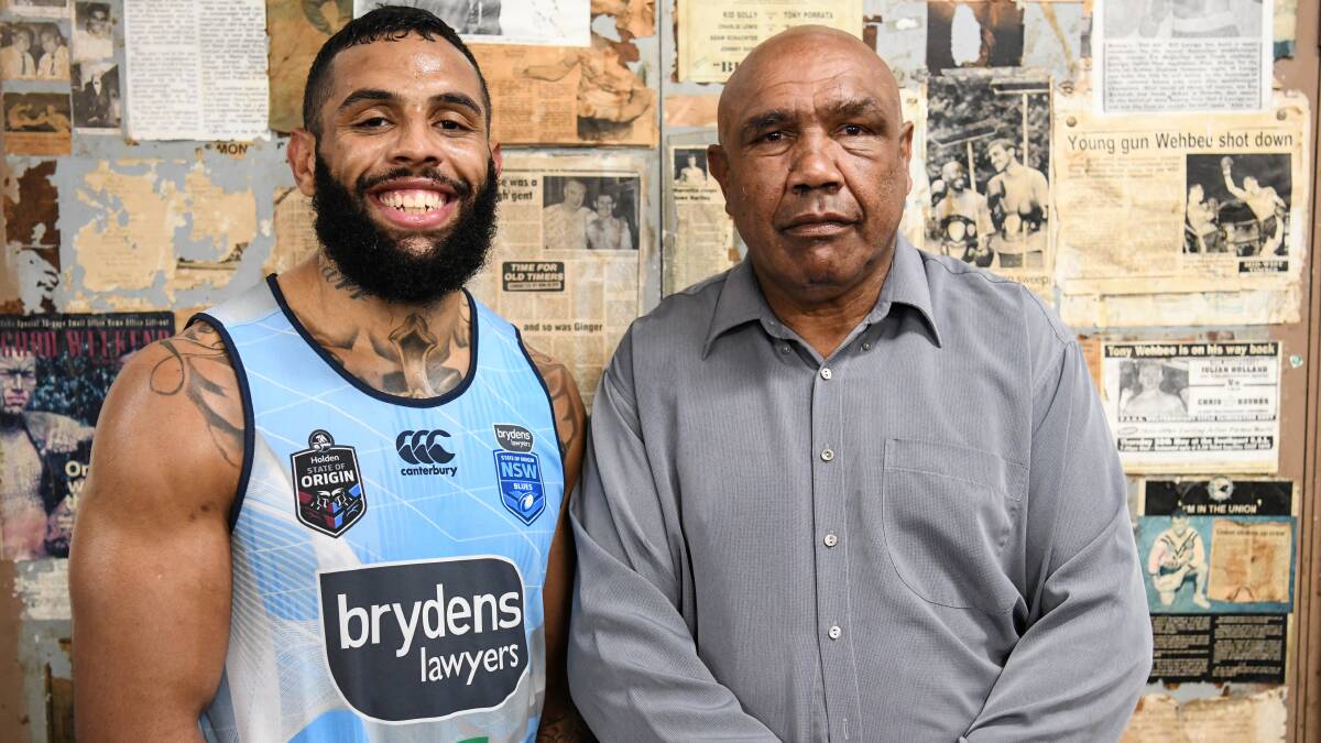 FAMILY: Josh Add-Carr and boxing champ, grandfather Wally Carr. Photo: AAP
