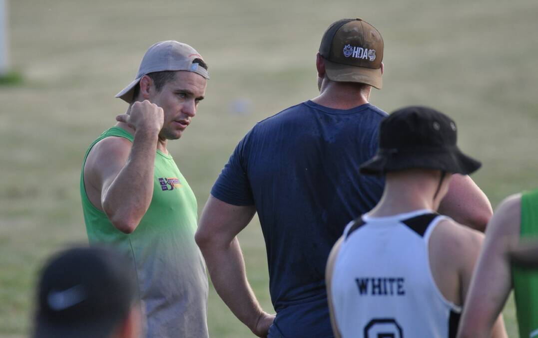 WHAT DO YOU THINK: Dan Mortimer and Anthony Redfern talk tactics during a CYMS training session at Norton Park. Photo: NICK McGRATH