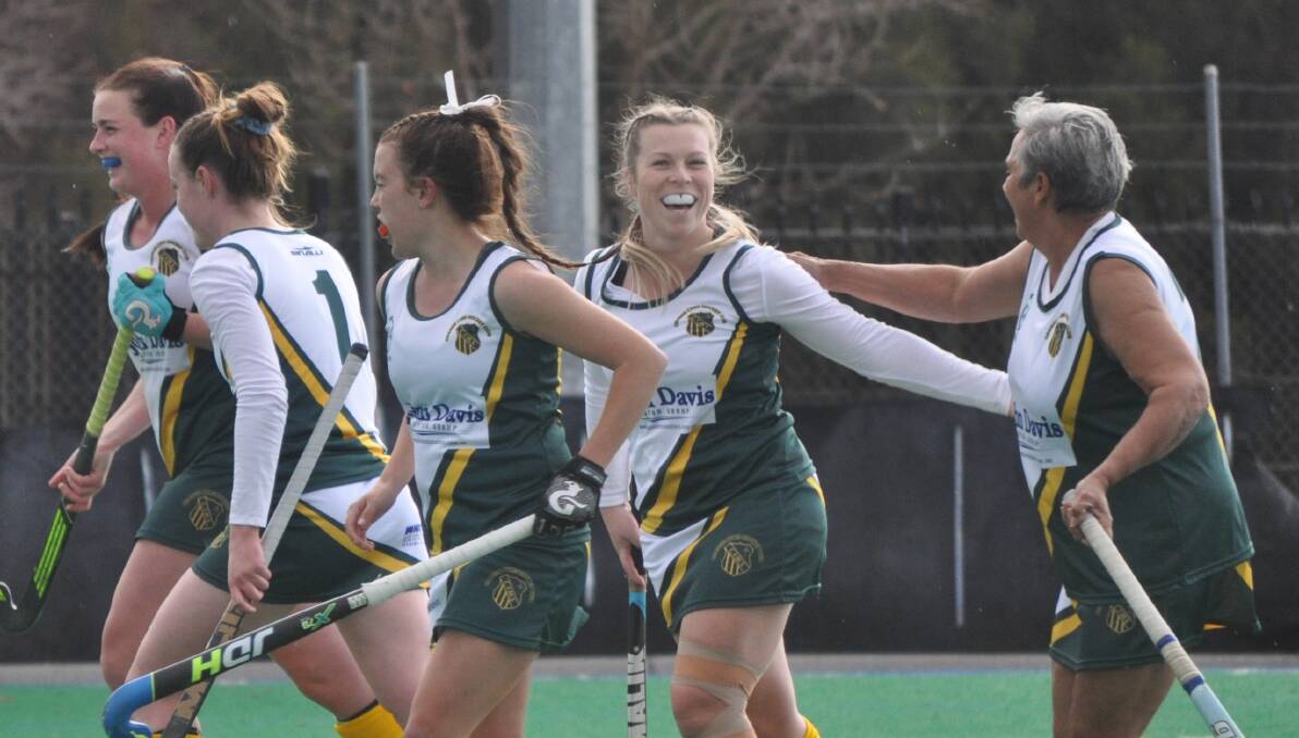 WINNERS ARE GRINNERS: CYMS celebrate Jade Georgiou's goal on Saturday. 
