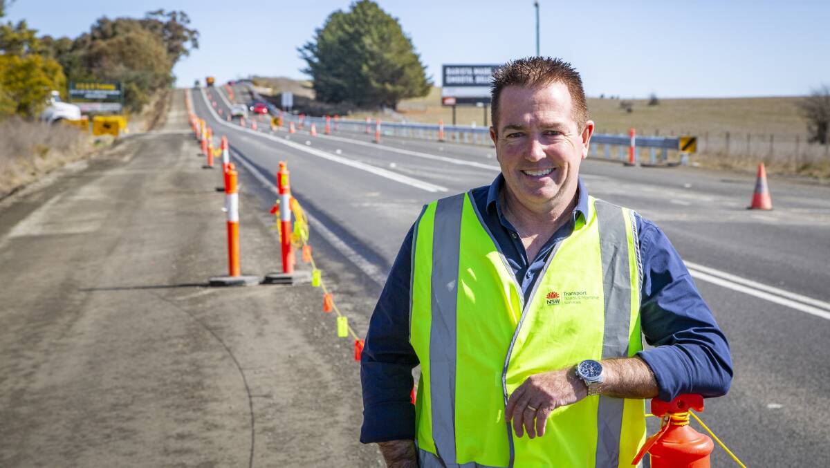 WORK DONE: Bathurst MP Paul Toole at the 1.3 kilometre section of the Mitchell Highway set for completion by the end of the week. Photo: SUPPLIED
