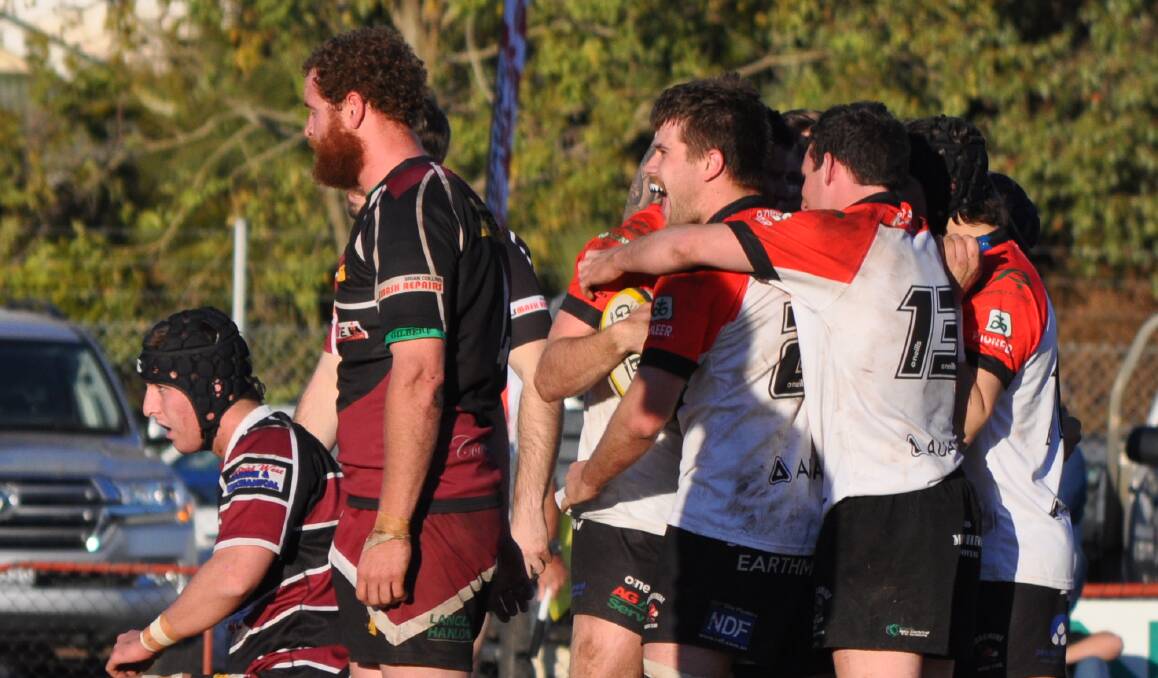 GOOD TIMES: The Gorillas celebrate the match-clinching try during last week's New Holland Agriculture Cup major semi-final win over Parkes at Cale Oval. 