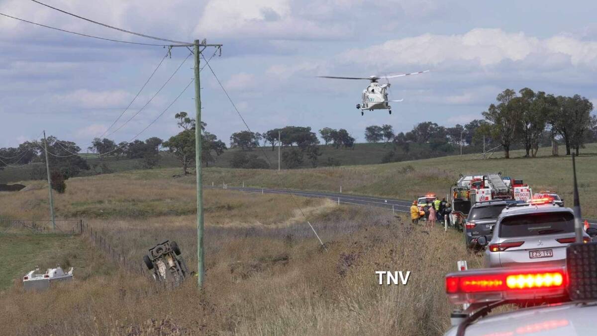The Toll Rescue Helicopter landing on the Mitchell Highway. Picture by Troy Pearson/TNV
