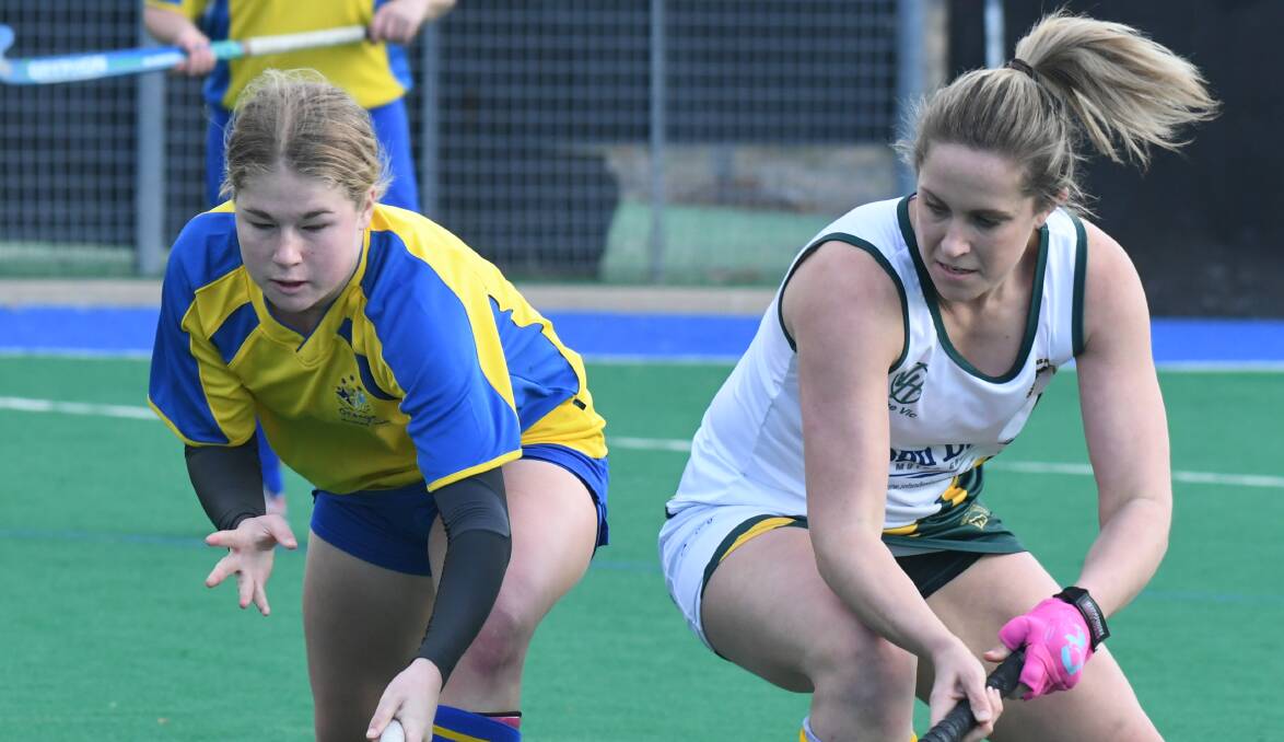 A BONE TO PICK: CYMS star Meredith Bone, pictured right, is keen for Saturday's minor semi-final clash with premiers Bathurst City. Photo: JUDE KEOGH