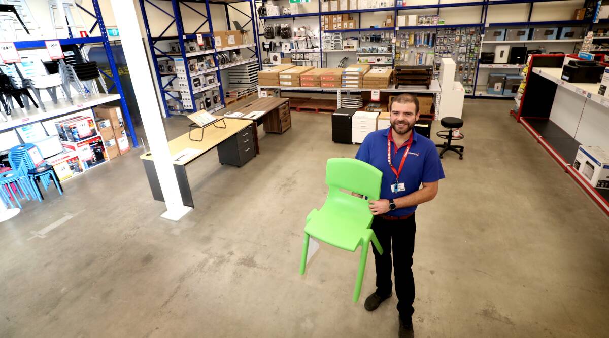 WORK PURCHASES: Adam Windsor has seen an increase in office equipment purchases at Officeworks Bathurst. Photo: PHIL BLATCH