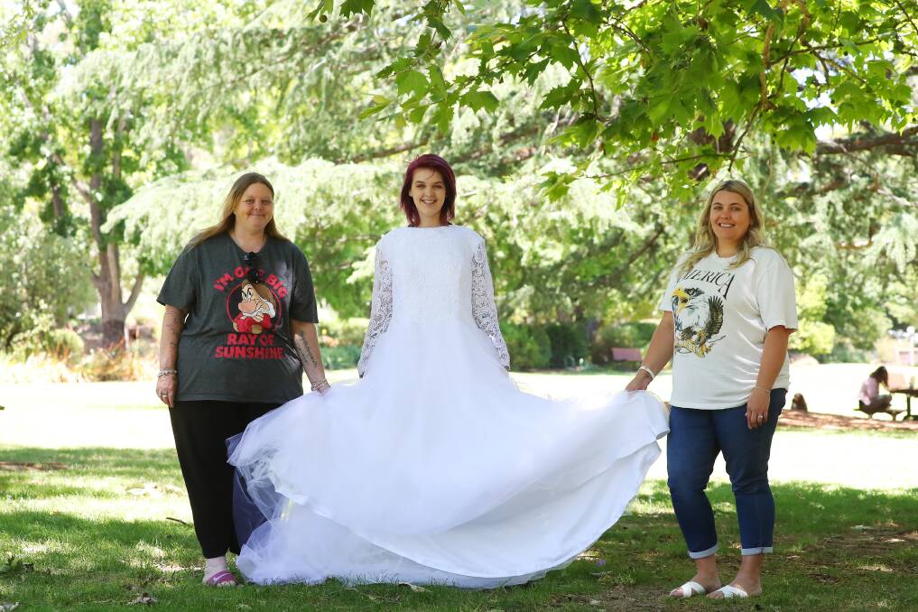 SECOND LIFE: Tracy Dawson, Tanya-Lee Dawson and Paige Starr at the Botanic Gardens where the wedding will take place. Picture: Emma Hillier 
