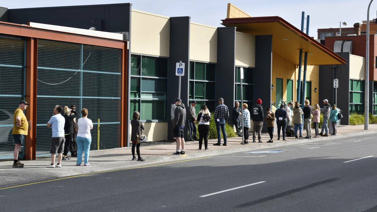 A queue forms outside Centrelink in Burnie earlier this year. Picture: Brodie Weeding 