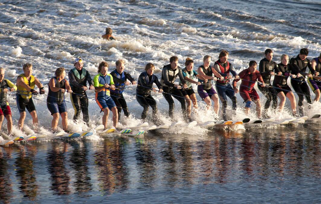 Steady: Water skiers keep upright as they capture the record 10 years ago at Strahan. Picture: Mark Seaton.