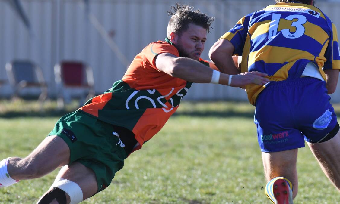 FAMILY TIES: Lachie Blunt desperately makes a tackle against Bathurst Bulldogs last weekend, he's made a huge impact in his first full season at Orange City. Photo: JUDE KEOGH