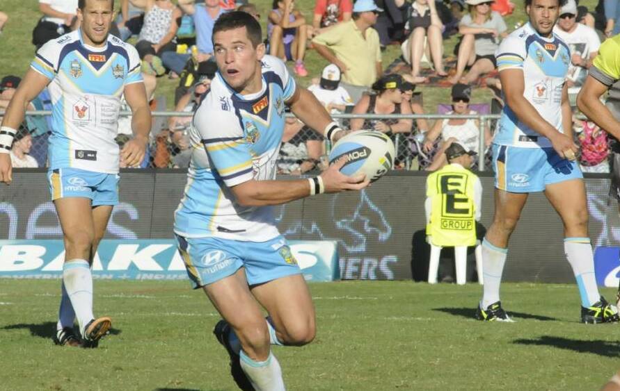 RETURN: Dan Mortimer playing for the Gold Coast at Carrington Park in 2015. He'll return to the ground for this year's NRL clash too, but he'll be playing for CYMS. Photo: CHRIS SEABROOK