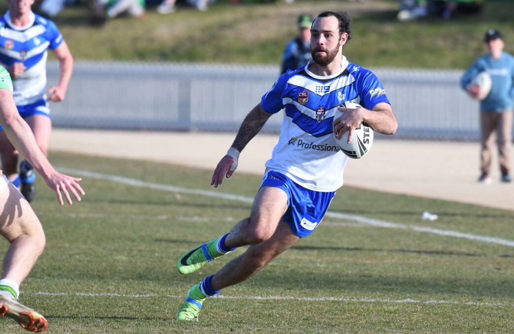TREBLE: Alex Knight swerves on his way to the first of his three tries on Sunday, the Saints' winger was playing just his second game in the top grade. Photo: CARLA FREEDMAN