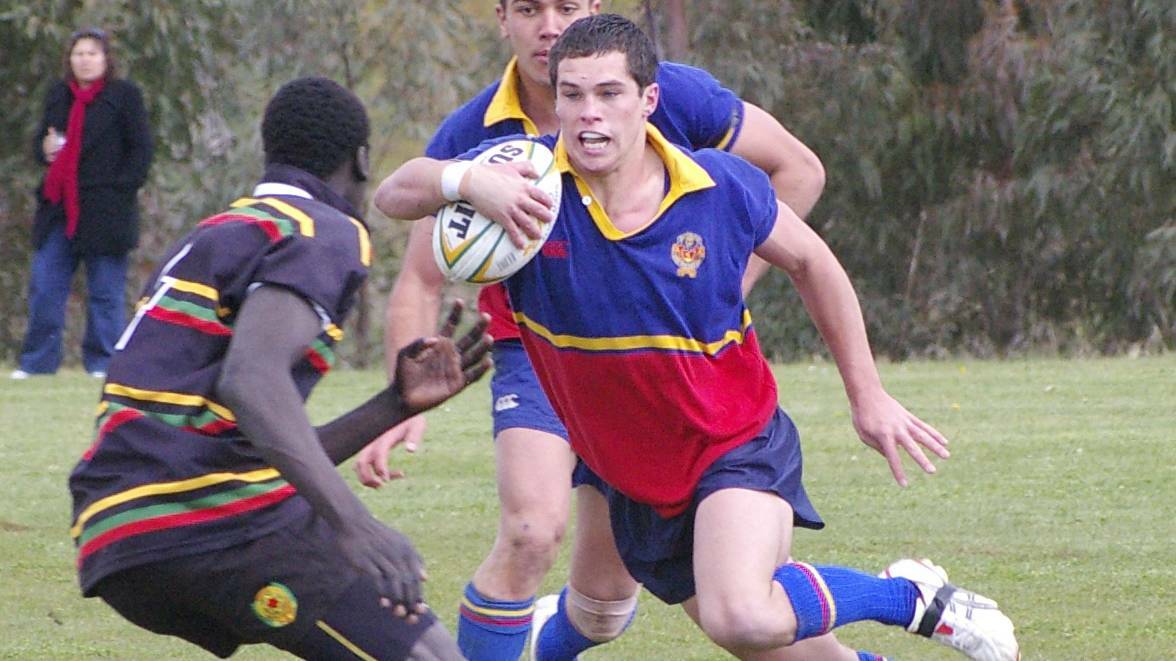 BACK IN THE DAY: Dan Mortimer shimmies through Illawarra Sports High's defensive line back in 2007, during James Sheahan's Yates Shield campaign. Photo: MARK LOGAN