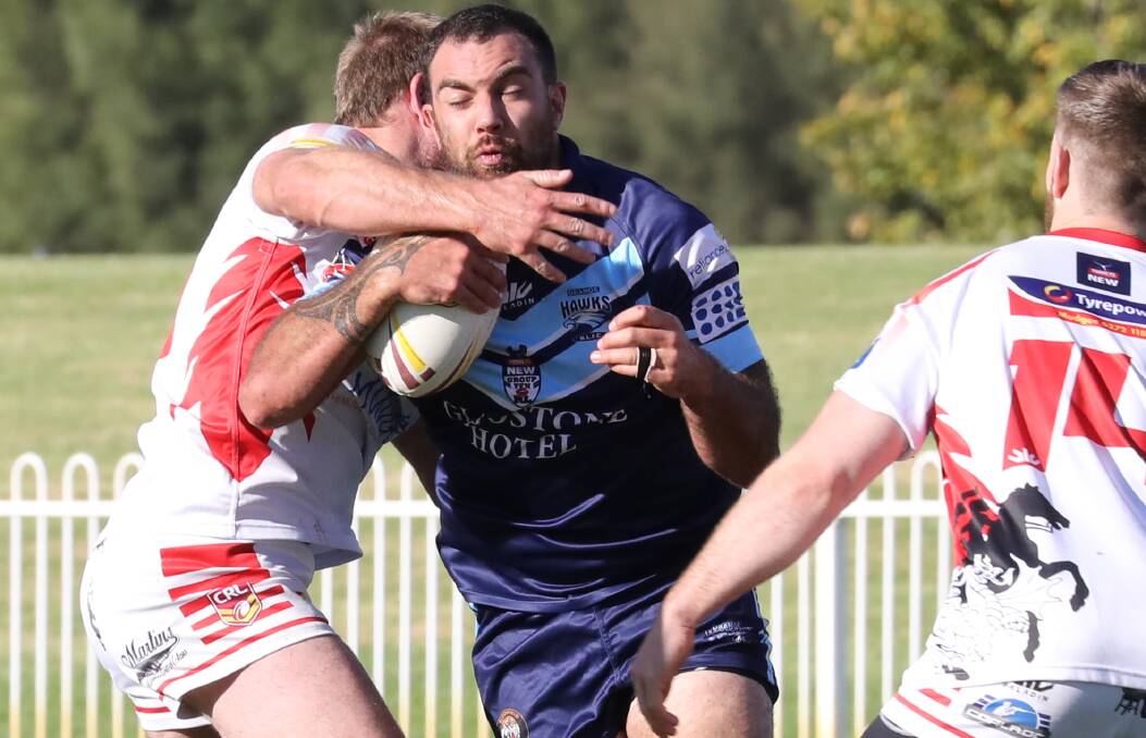 IMPACT: Jared Brodrick makes a run at the Mudgee defence.