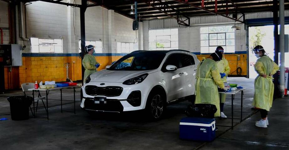 GET A TEST: A drive-through testing clinic is available at the former Clancy Motors site in Howick Street. Photo: FILE