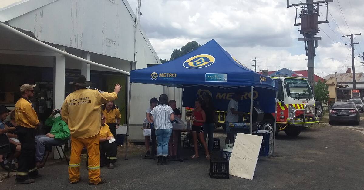 FOOD FOR THOUGHT: An Australia Day barbecue at Perthville store was a rewarding day for the local Rural Fire Service and fun for locals.