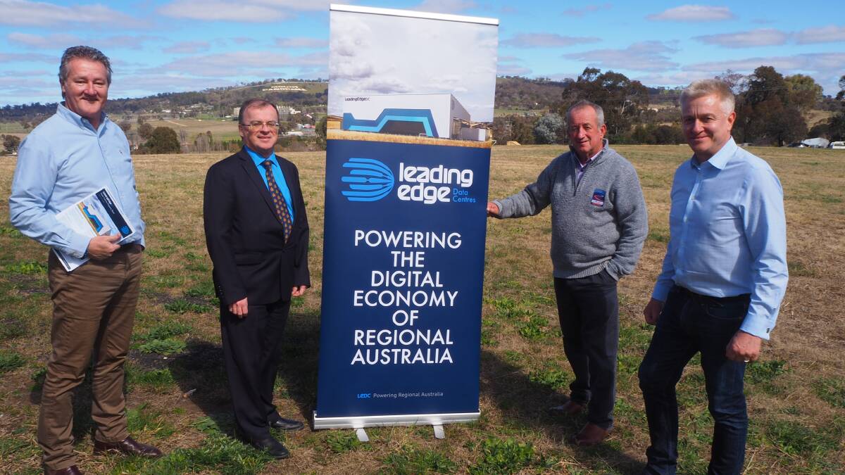 IT CROWD: Leading Edge Data Centres' director of client services Wayne Rowley [left] and chief executive officer/founder Chris Thorpe [right] with council's general manager David Sherley and mayor Bobby Bourke back in August 2020.