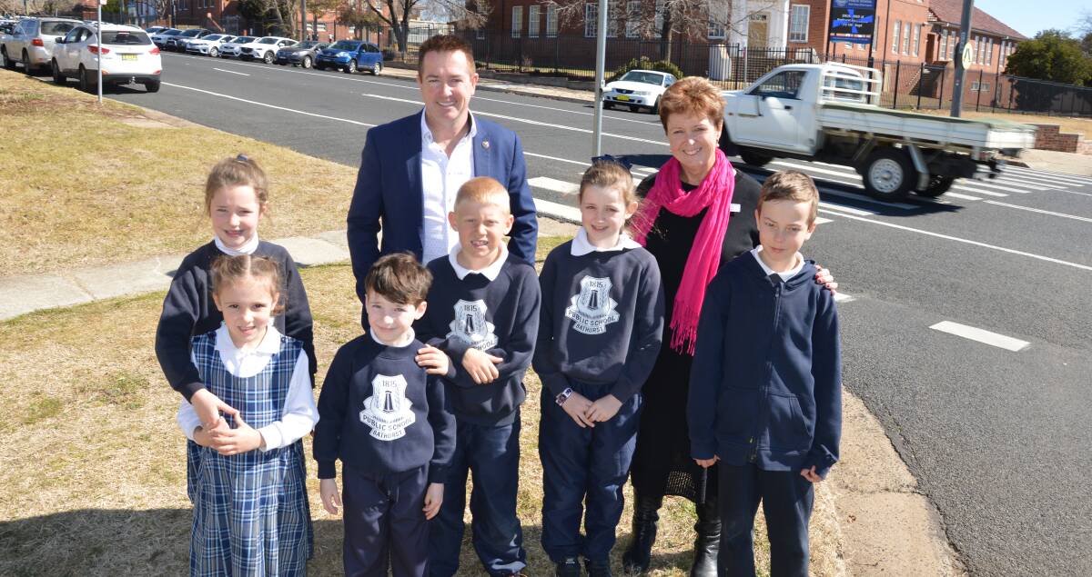 SAFETY FIRST: Bathurst MP Paul Toole and Bathurst Public School principal Kate White with students at the George Street crossing. Photo: SUPPLIED