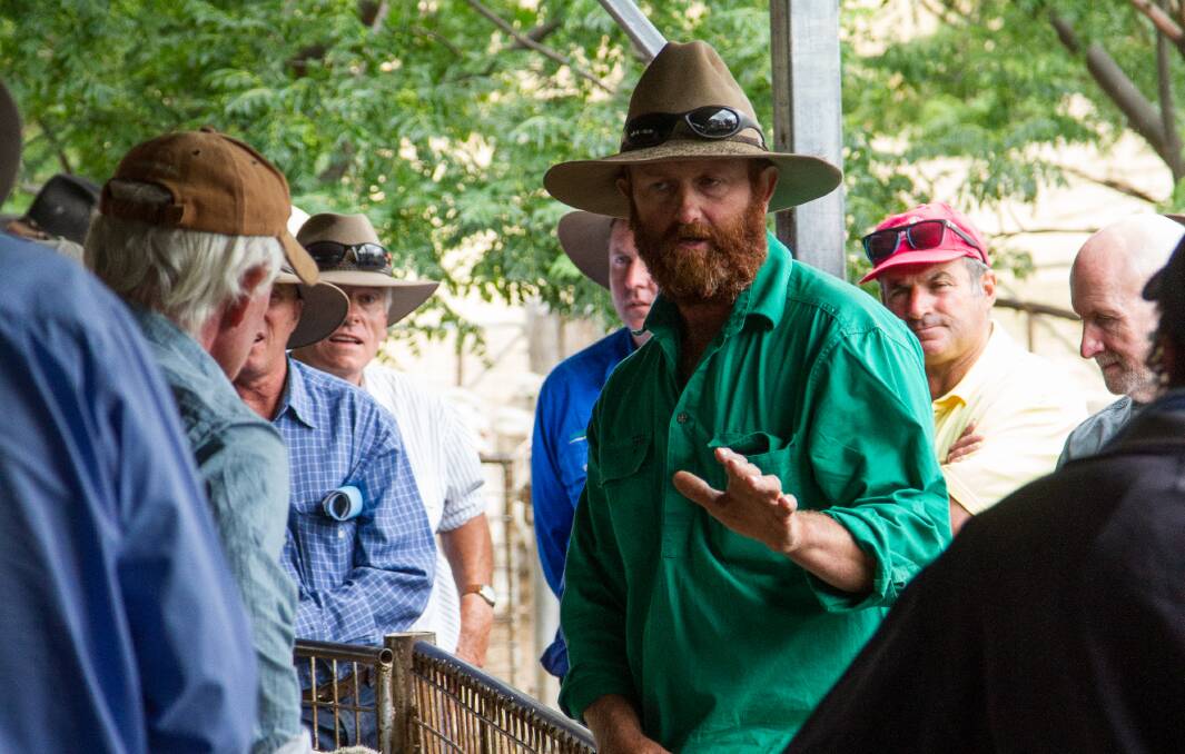 MAN ON THE LAND: Bathurst Merino Association ewe competition winner Murray Wykes of “Mount Top”, Euchareena takes part in a “forum in the sheepyards” on judging day.