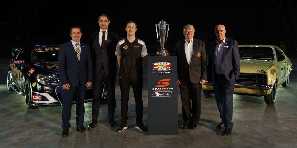 SYDNEY LAUNCH: Paul Toole, Sean Seamer, David Reynolds, Colin Bond and Graeme Hanger with the Peter Brock Trophy at the launch of the Great Race last month. Photo: SUPERCARS