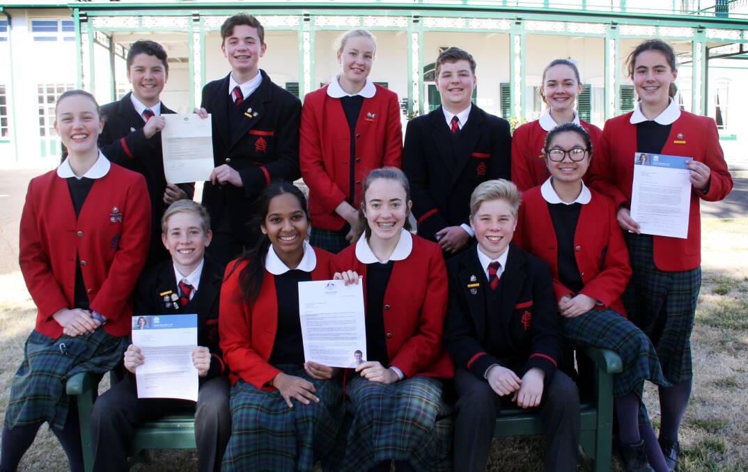 YOUNG VOICES: All Saints' College Year 9 students with the written responses to their concerns about the impact of plastic waste. Photo: SUPPLIED