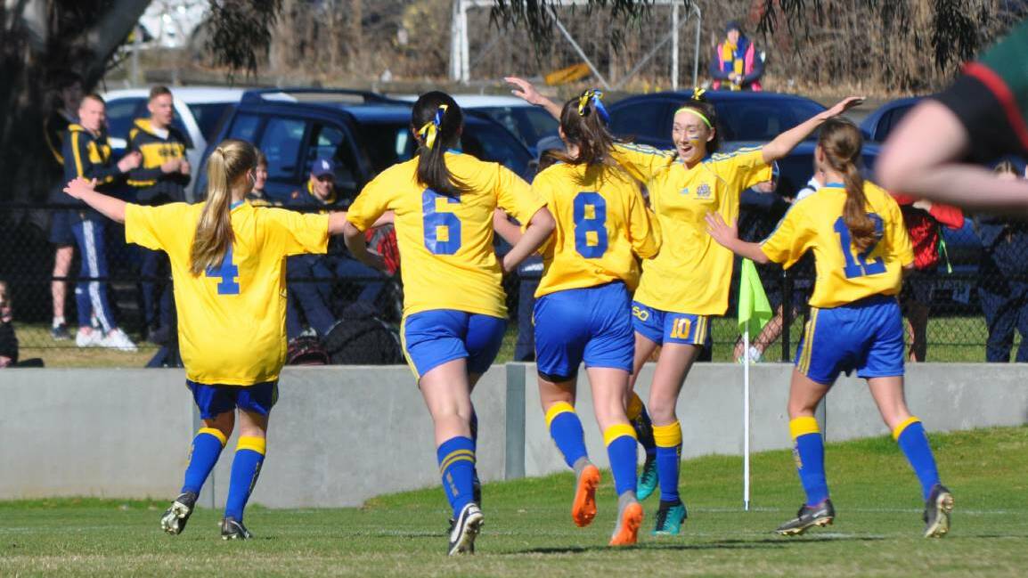 WHAT A FEELING: Bathurst High's Sam Burrow celebrates her side's second goal during a 4-1 win over Dubbo College on Friday. Photo: NICK McGRATH