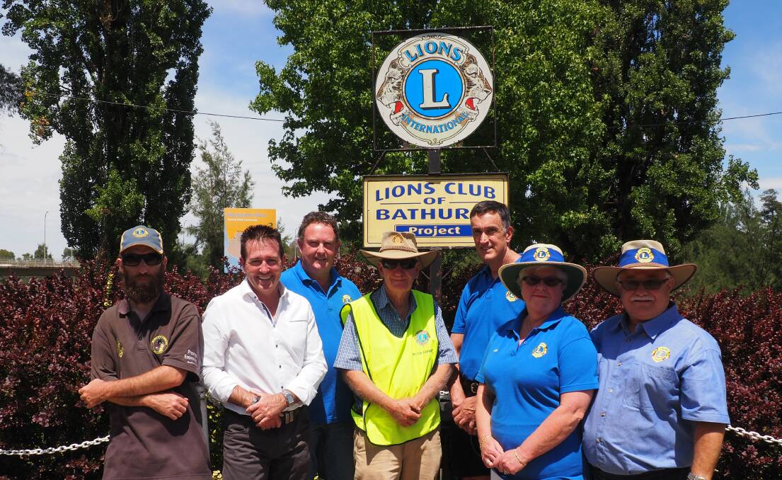 HELPING HAND: Bathurst MP Paul Toole (second from left) with Lions Club of Bathurst members John Mulligan, David Morris, Bruce Mulligan, Mal Purves, Judy Chircop and Dominic Chircop. Photo: SUPPLIED