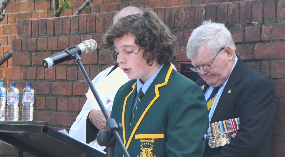 ADDRESS: Assumption School student Jamie Mulholland during Monday's Remembrance Day service.
