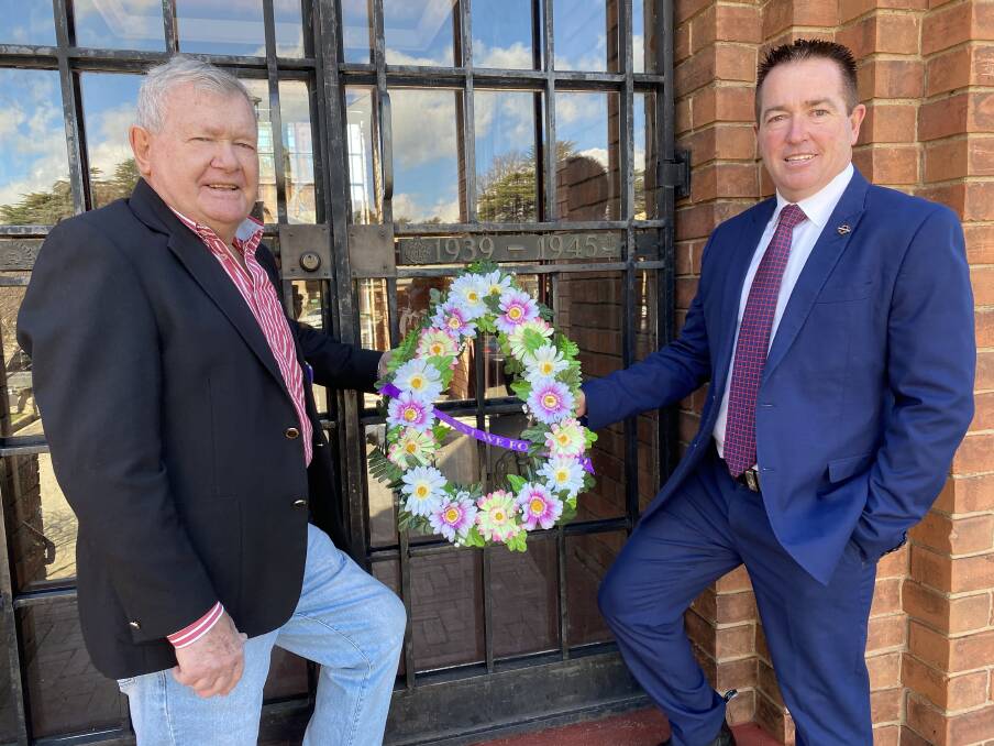 LEST WE FORGET: David Mills from the Bathurst RSL sub branch and Bathurst MP Paul Toole at the War Memorial Carillon. Photo: SUPPLIED