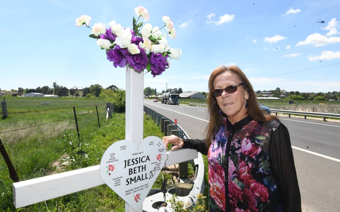 MEMORIAL: Ricki Small with a memorial to her daughter Jessica, who was last seen alive on Hereford Street 21 years ago. Photo: CHRIS SEABROOK