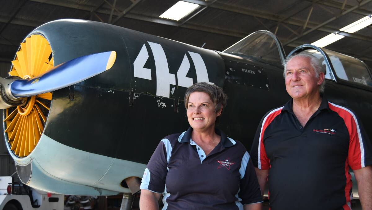 FLYING HIGH: Tammy and Charlie Camilleri with their Nanchang CJ6A, a Chinese warbird from the 1970s.
