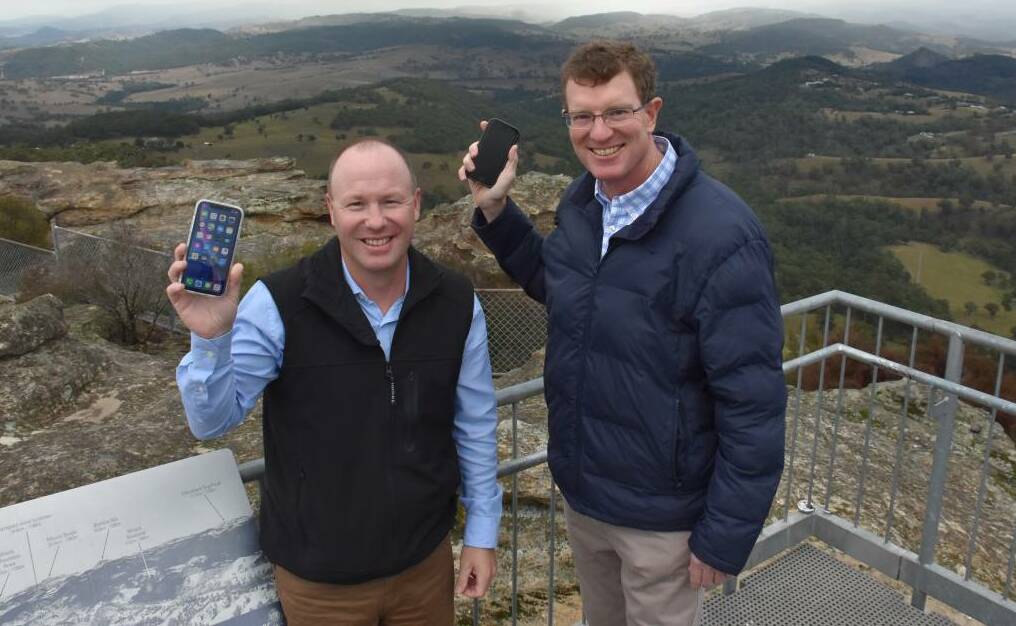 HOLD THE PHONE: Kanimbla Valley resident Jason Green with Member for Calare Andrew Gee. Picture: KIRSTY HORTON.