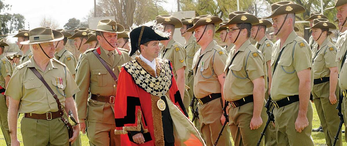 POMP AND CEREMONY: Former Bathurst mayor Paul Toole inspects the parade with commanding officer Lieutenant Colonel P.J. Morrissey when the 1/19 Battalion was granted Freedom of Entry to the City in 2009.
