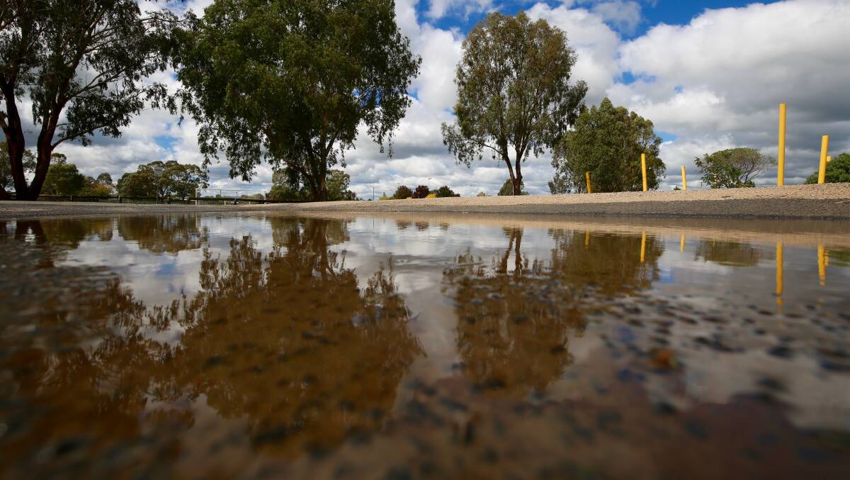 WET WET WET: Plenty of water on the ground at Eglinton Oval on Saturday morning following the Bathurst region's wettest 24-hour period in more than a year. Photo: PHIL BLATCH