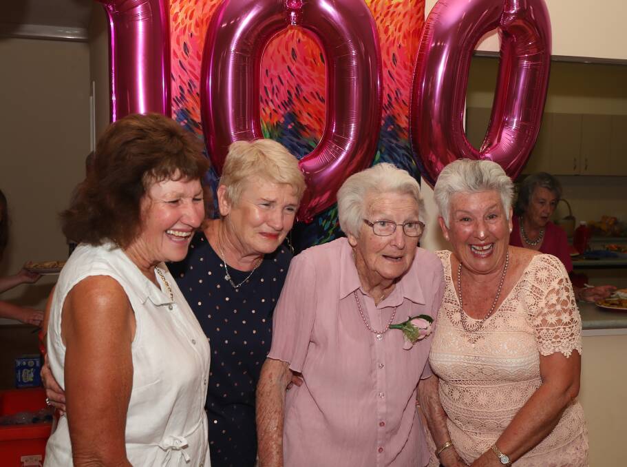TRIPLE FIGURES: Doris Austin (second from right) with daughters Rhonda Harber, Sandra Elms and Marilyn McClements on Saturday. Photo: PHIL BLATCH