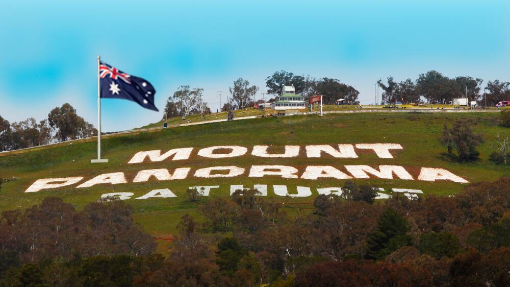 FLY THE FLAG: An artist's impression of a giant flagpole and Australian flag being flown over the Mount Panorama signage at the top of the Mount. 