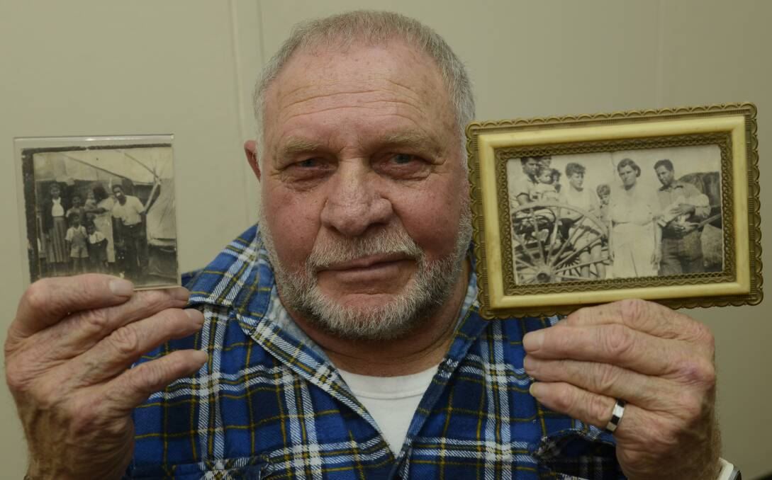 STORYTELLER: Kalmadyne Goombridge with photos of his family from their days on the Namoi Reserve. Photo: PHILL MURRAY 070716pjim