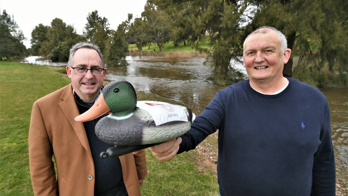READY, SET, SWIM: Steve Semmens and Jeff Muir are looking forward to this year's Corporate Duck Race. Photo: CHRIS SEABROOK