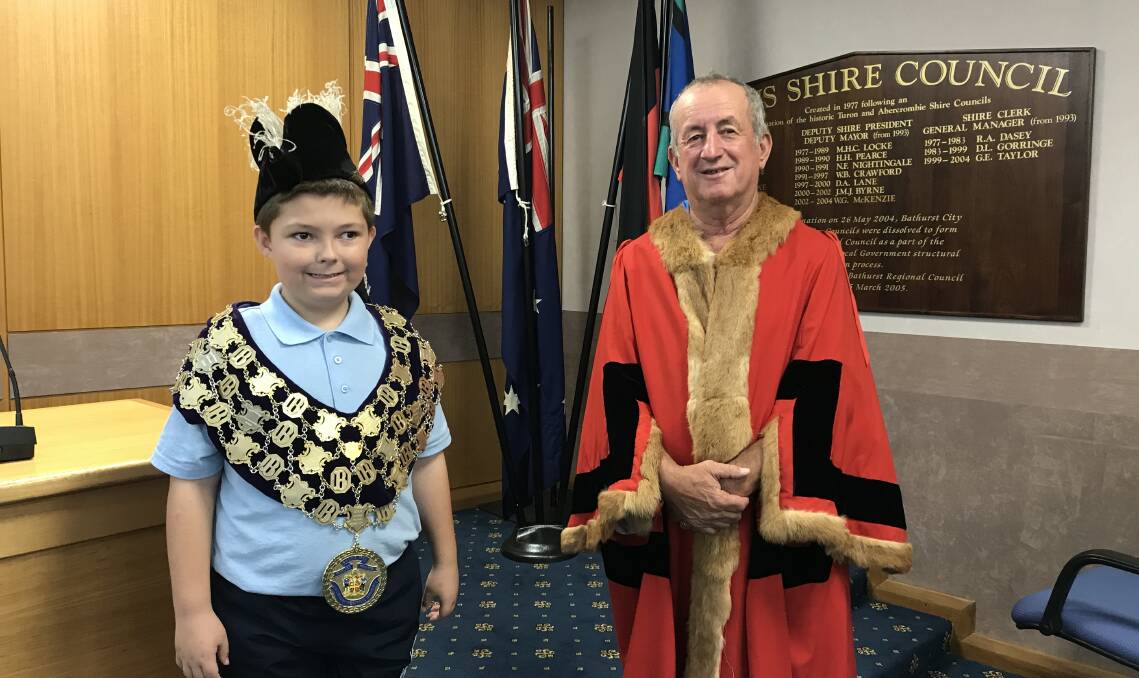 SCHOOL VISIT: Saxon Jelly with Mayor Bobby Bourke inside the Bathurst Regional Council chamber this week. Photo: SUPPLIED