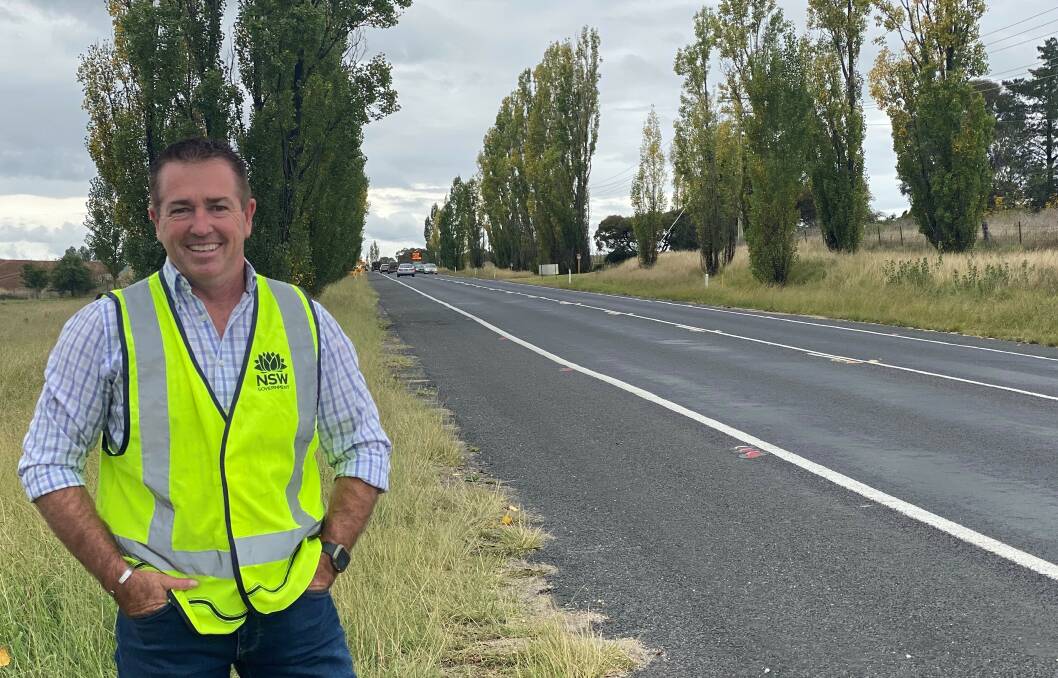 TREE-MENDOUS: Bathurst MP Paul Toole on the Great Western Highway between Kelso and Raglan, where a new avenue of trees will be planted to replace the existing poplars. Photo: SUPPLIED