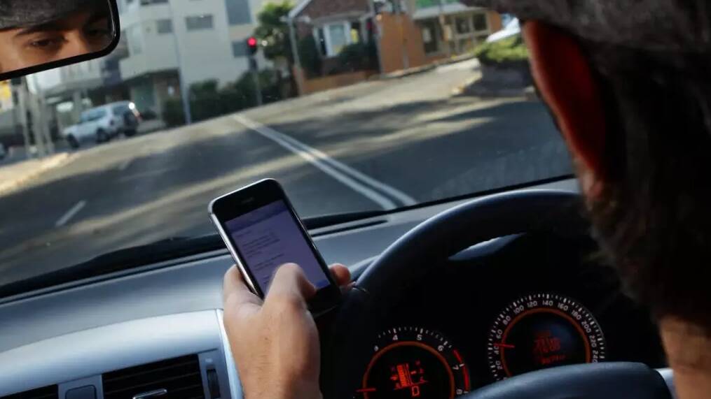 Increased demerit points for drivers caught using phone