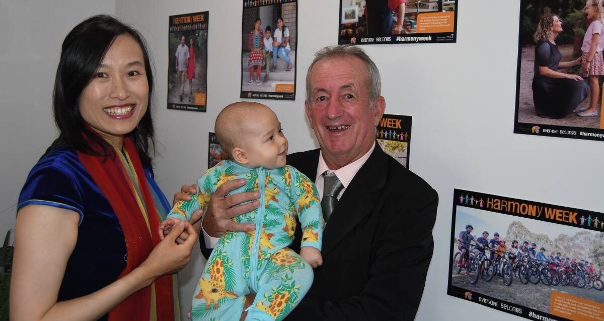 DIVERSITY: Mayor Bobby Bourke with Dr Miao Li and six-month-old Judo Li at Monday's Harmony Week launch at The Neighbourhood Centre.