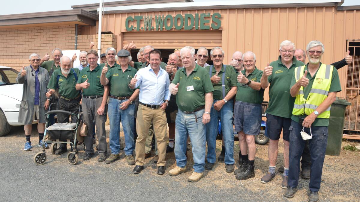 WOODIES: Bathurst MP Paul Toole with Central Tablelands Woodcraft president Mike Hardie and other members. Photo: SUPPLIED