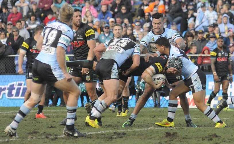 ACTION: The Cronulla Sharks and Penrith Panthers previously met at Bathurst's Carrington Park in 2014.