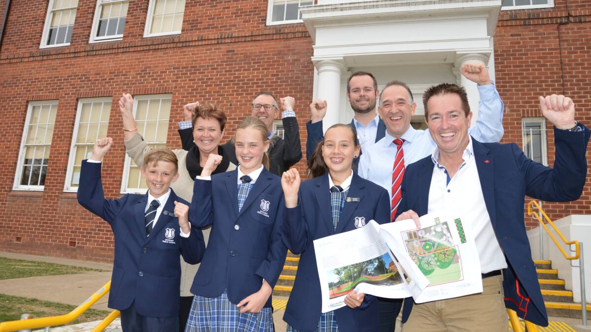 IN THE MONEY: Bathurst Public School principal Kate White, Skillset team members David Cooke, Thomas Staff and Craig Randazzo and Bathurst MP Paul Toole celebrate with school captains Josh Pringle, Evie Goninan and Mia Clements.