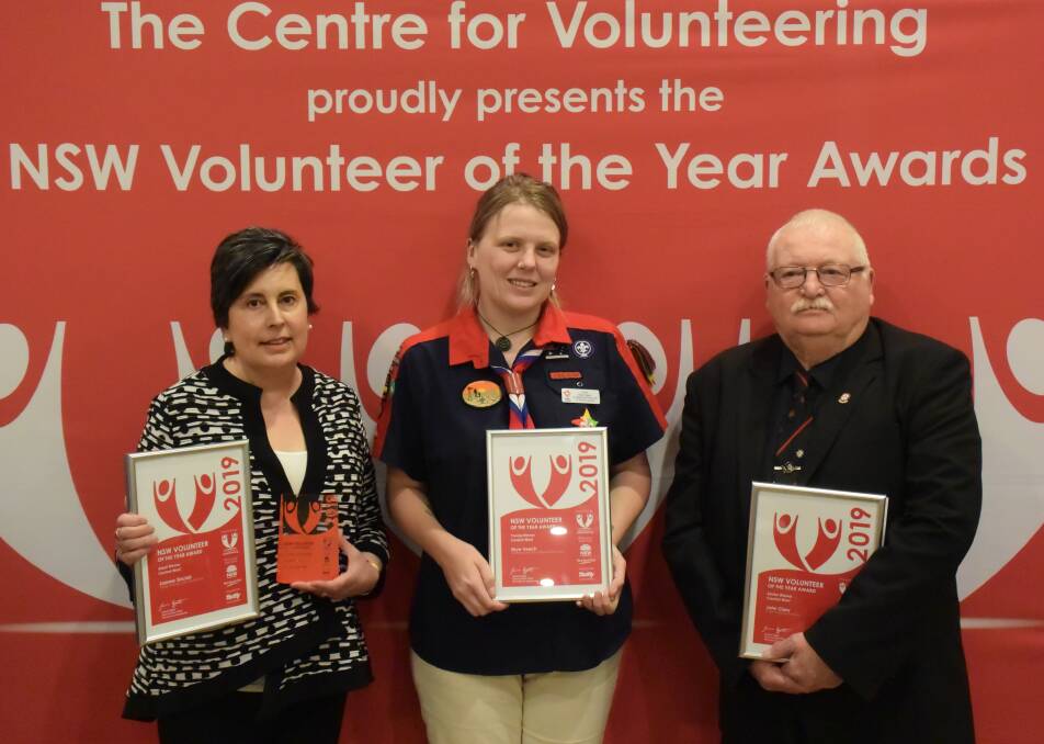 HELPING HANDS: Volunteer of the Year Joanne Sinclair from Orange with Young Volunteer of the Year Skye Veech (Bathurst) and Senior Volunteer of the Year John Clary (Bathurst) at Thursday's ceremony. Photo: ETHAN LAW