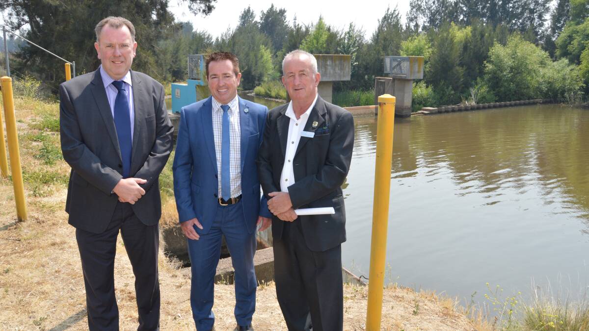 CASH SPLASH: Council's engineering services director Darren Sturgiss, Bathurst MP Paul Toole and mayor Bobby Bourke at the water filtration plant on Monday.