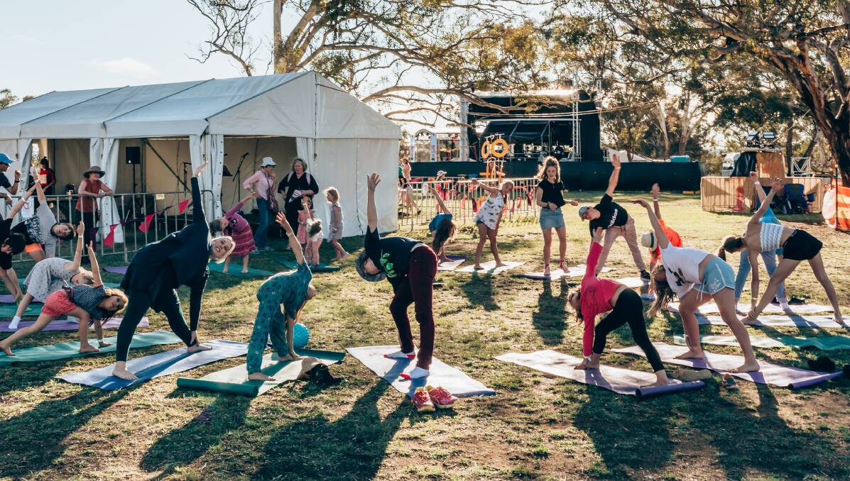 BEND AND STRETCH: Participants getting into the spirit of Kids' Yoga at the Inland Sea of Sound Festival in 2018. Photo: TRENT CASH