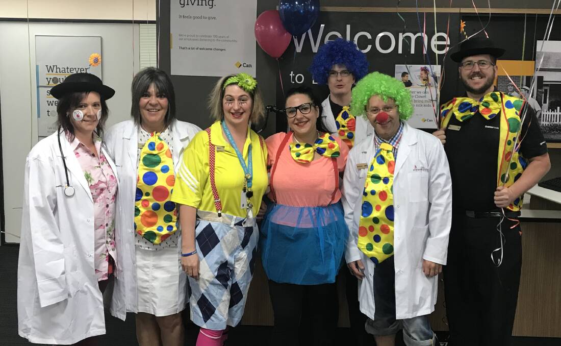 BEST MEDICINE: Staff from the Bathurst branch of the Commonwealth Bank dressed up to support The Humour Foundation which runs the Clown Doctors program. Photo: SUPPLIED