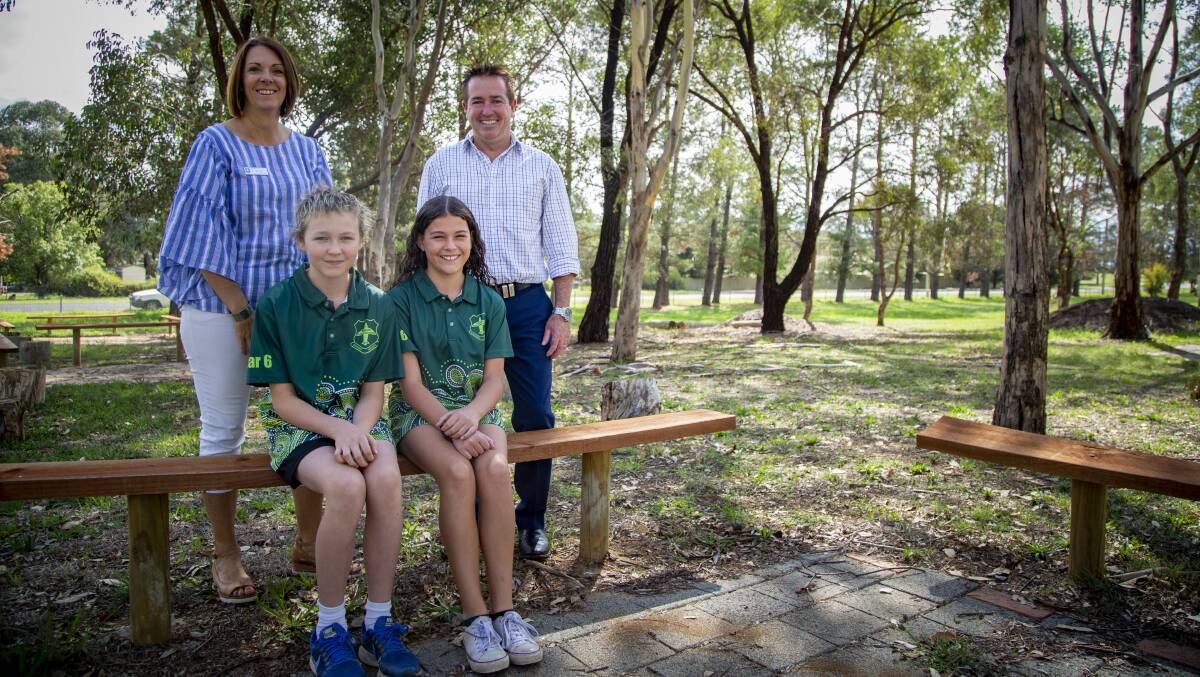ENVIRONMENT: Bathurst MP Paul Toole with Raglan Public School principal Jo Cafe and captains Brodie Cashman and Alani Swiegers.