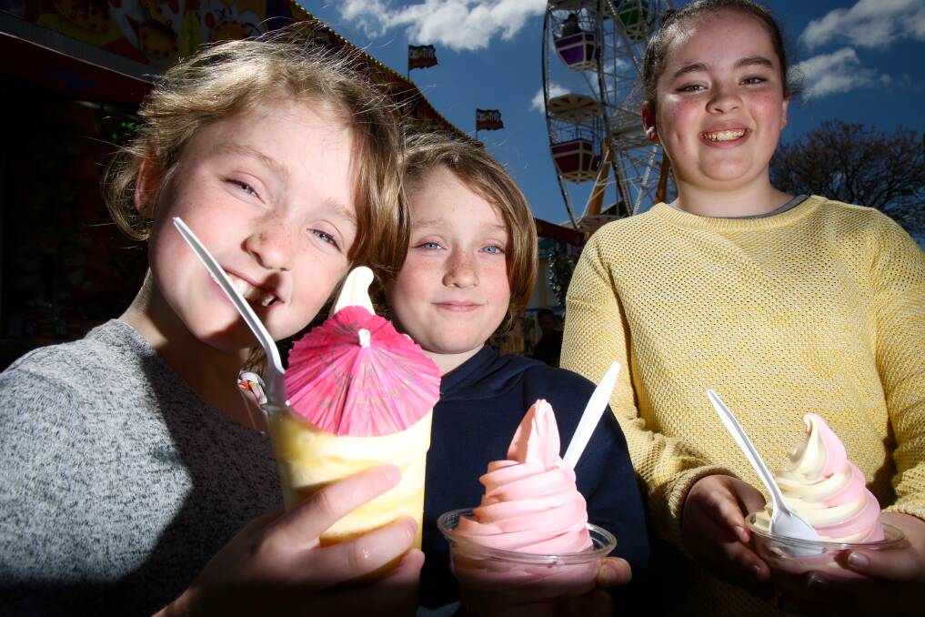 FUN TIME: Willow and Faith Evans with Lauren Foster at the Bathurst Fun Fair in September. The fair is back at Bathurst Showground this weekend. Photo: PHIL BLATCH